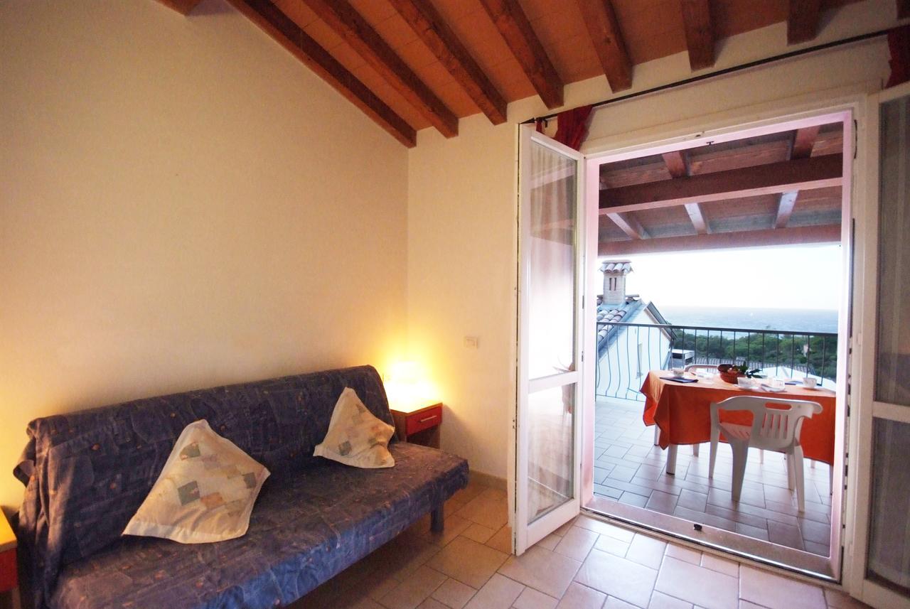 Nisportino Domus Aparthotel Nisporto ภายนอก รูปภาพ